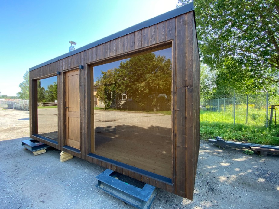 attēls, kurā attēlota koka moduļu māja