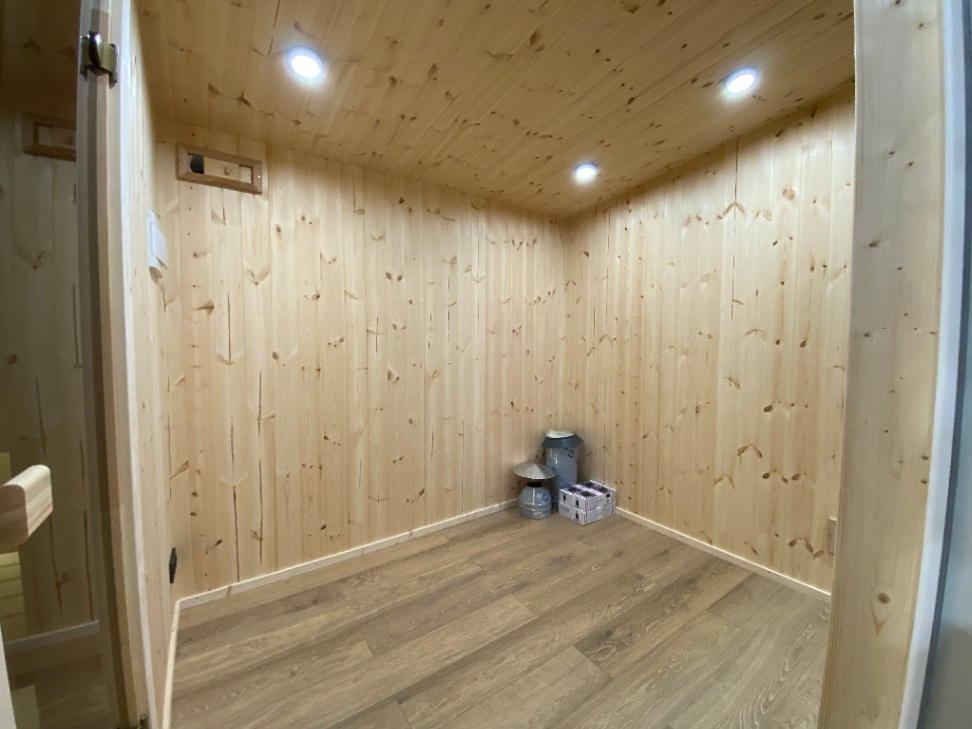 Insulated sauna house with terrace