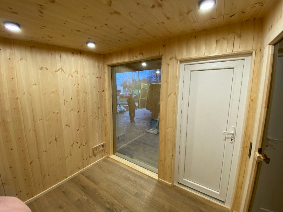Insulated sauna house with terrace
