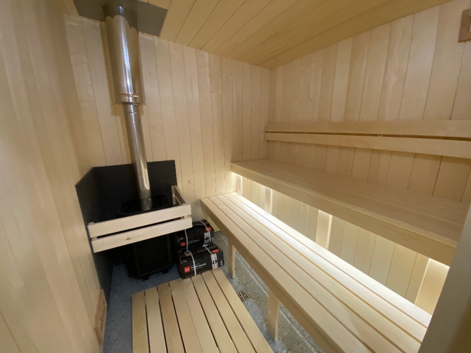 Insulated sauna house with terrace