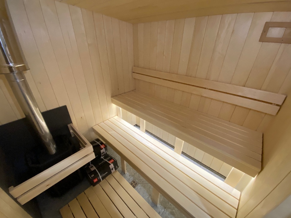 Insulated sauna house with terrace