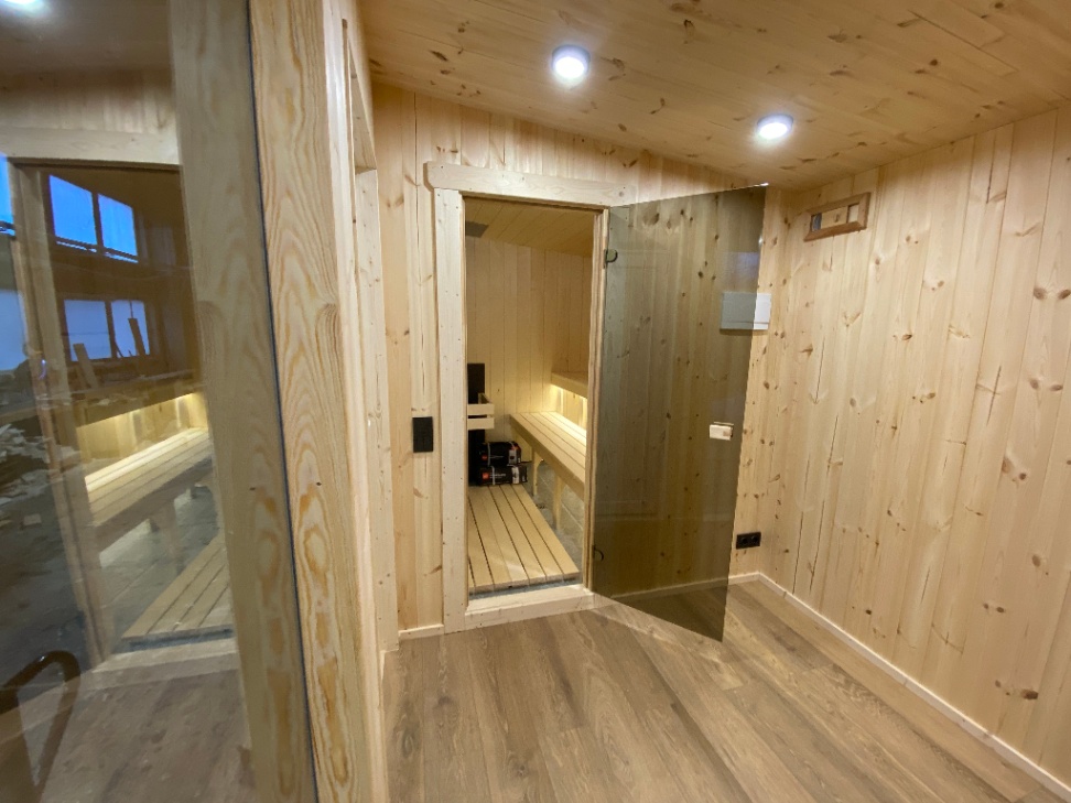 Insulated sauna house with terrace